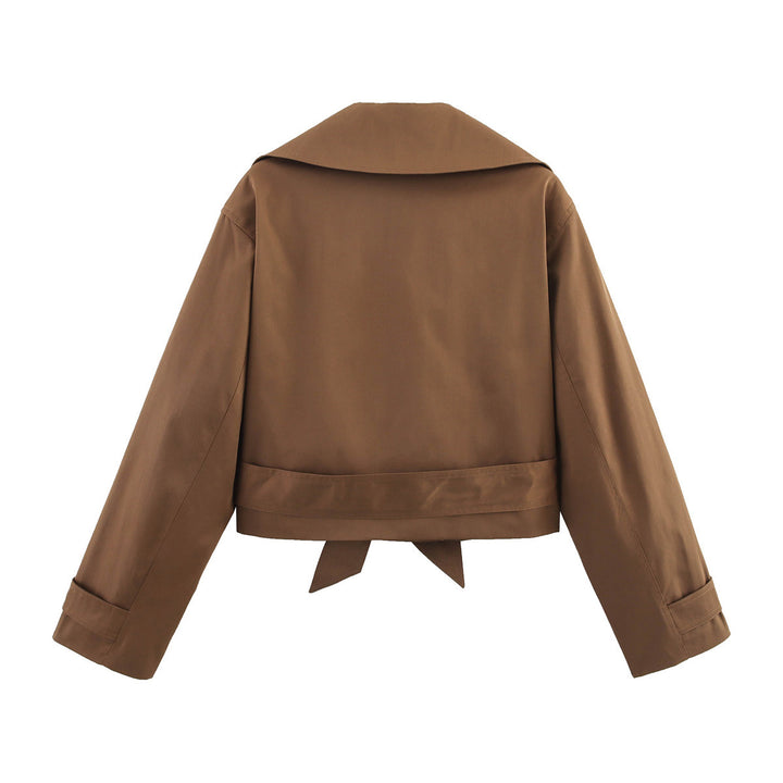 Ladies short waist trench coat with double-breasted button placket, wide shawl collar, and figure-flattering tie belt Mune Fashion