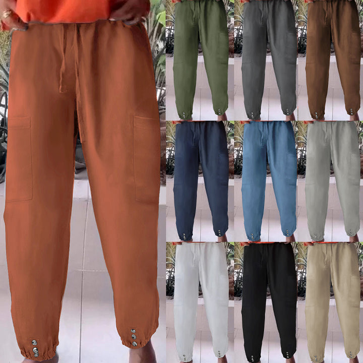 Ladies cargo jogging pants with drawstring, patch pockets and button cuffs Mune Fashion