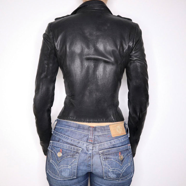 Women no tailored faux leather biker jacket with stand-up collar, shoulder patches, and zippered pockets Mune Fashion