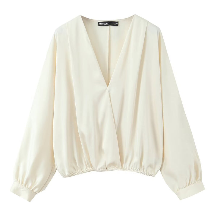 Women's satin blouse with deep wrap V-neck, elastic hem, and balloon sleeves Mune Fashion