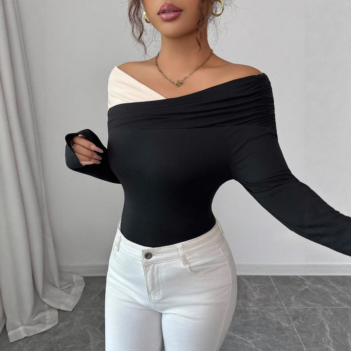 Women’s asymmetrical Carmen top with shoulder gathering and body-hugging jersey fit Mune Fashion