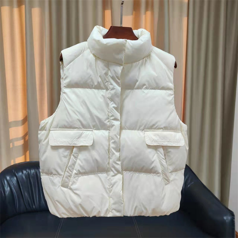 Women's quilted thermal vest with high stand-up collar and patch flap pockets Mune Fashion