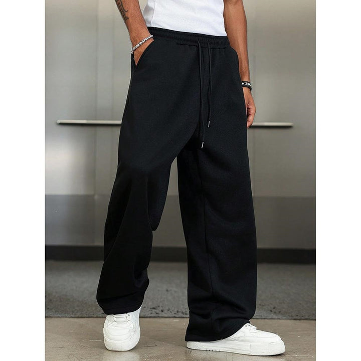 Men's wide Relax fleece pants with a deep crotch, elastic drawstring waistband, and casual side pockets Mune Fashion