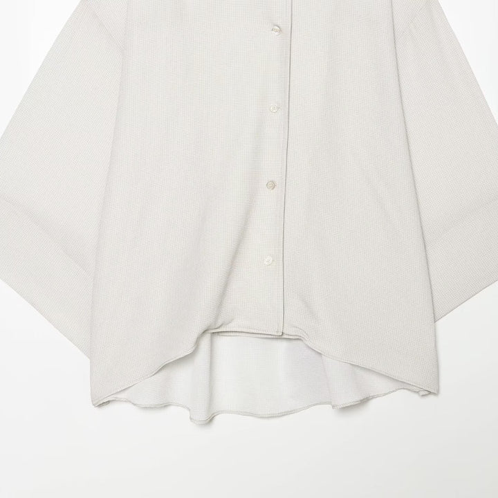 Women's oversized shirt blouse with waffle texture, boxy silhouette, and high-low hem