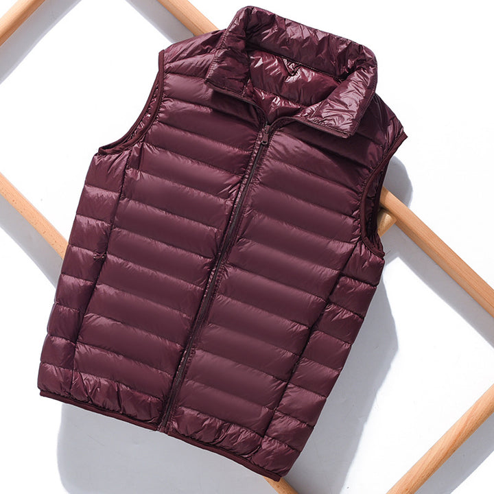 Women's lightweight packable quilted vest with high collar and wind-resistant microfiber shell Mune Fashion