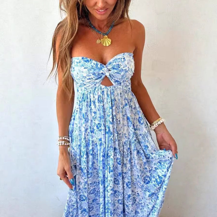 Ladies' strapless twisted bustier maxi dress with cut-out and multi-layered tiered skirt in lightweight crinkle quality Mune Fashion