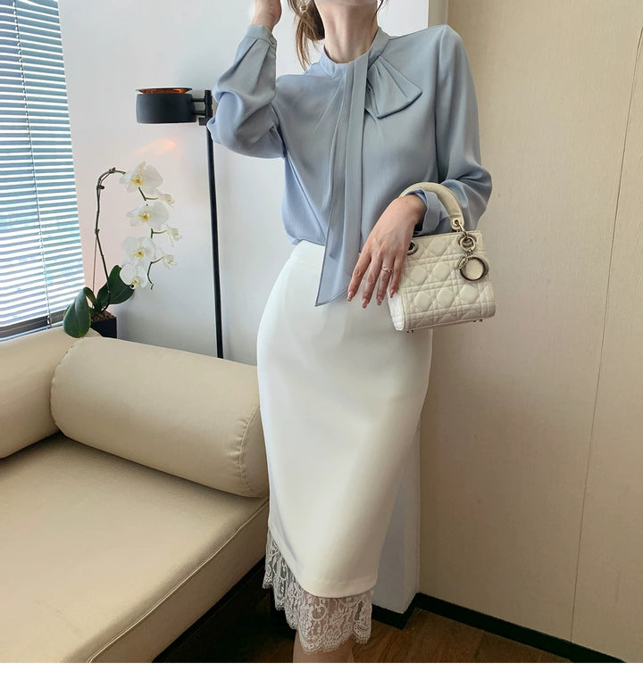 Women Elegant and figure-hugging blouse with bow detail Drune