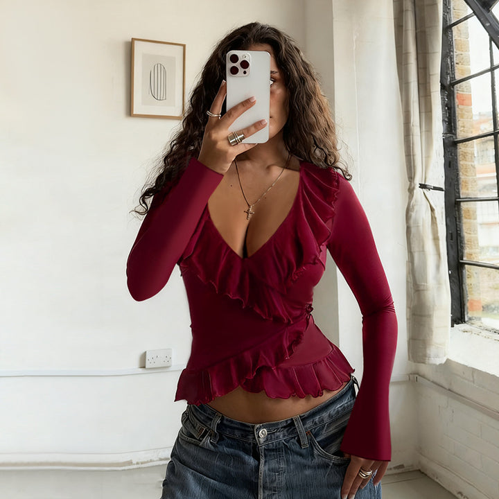 Women's long sleeve shirt with deep V-neck, asymmetric ruffles, and fitted peplum Mune Fashion