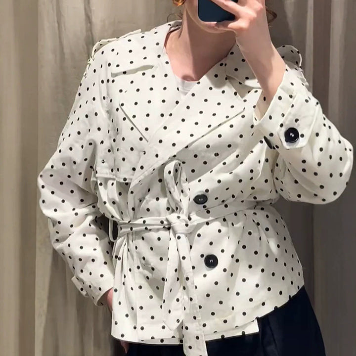 Women’s short trench coat with double breasted front, belt at the waist and polka dot print Mune Fashion