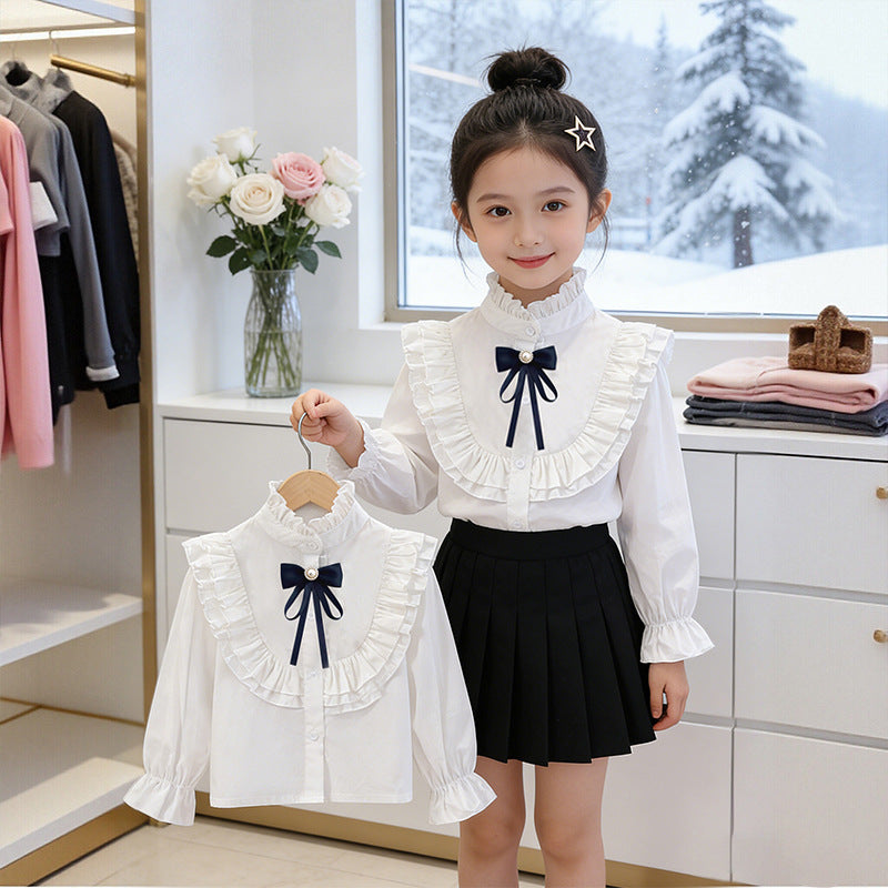 Girls elegant ruffle blouse with decorative bow closure Mune Fashion
