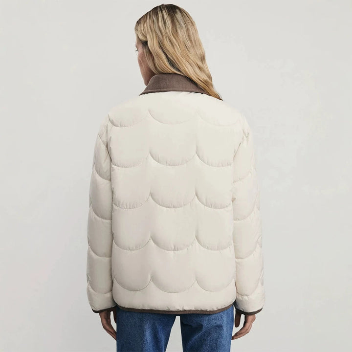 Women's quilted short jacket with wave quilting and cord collar Mune Fashion