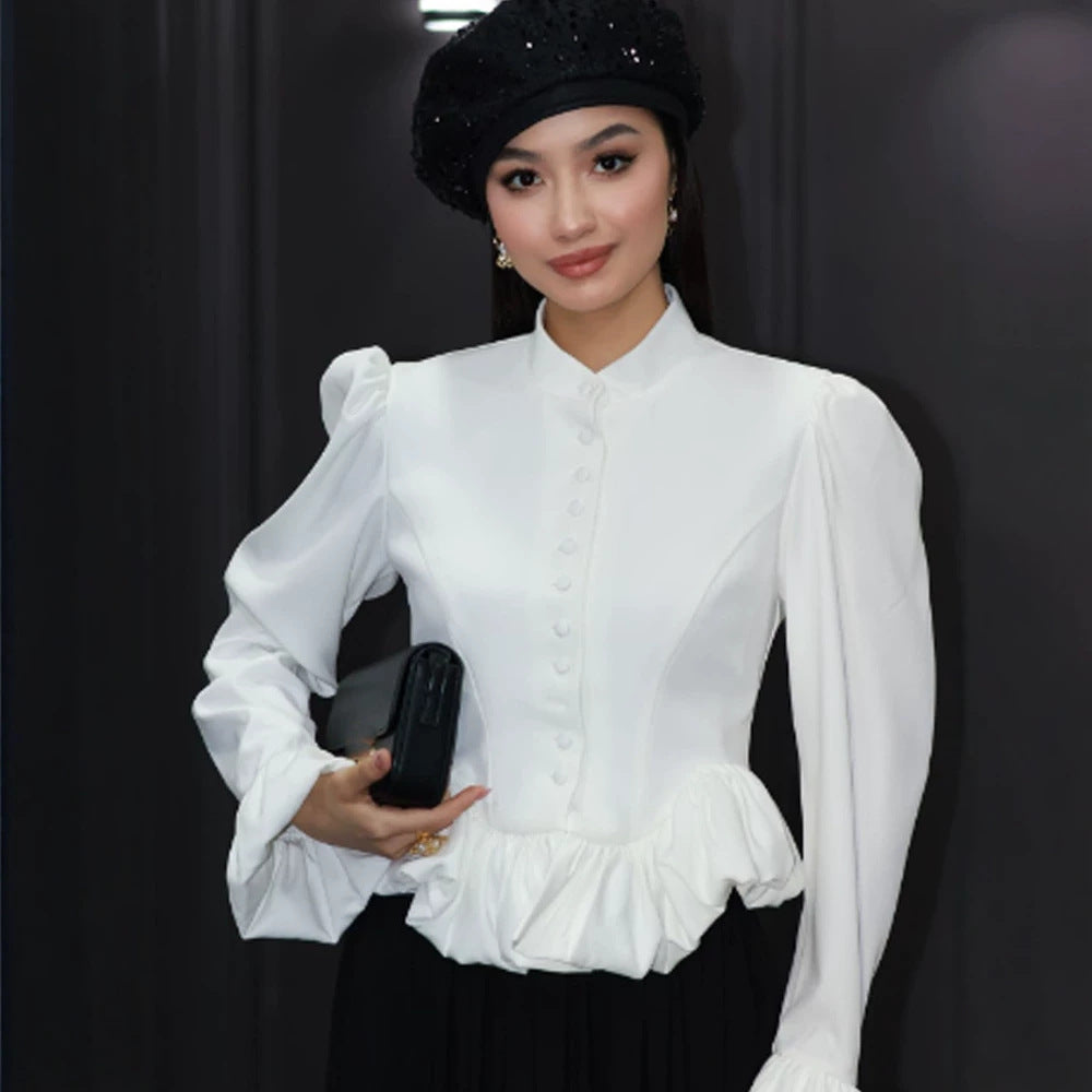 Ladies tailored peplum blouse with stand-up collar, covered button placket and puff sleeves Mune Fashion