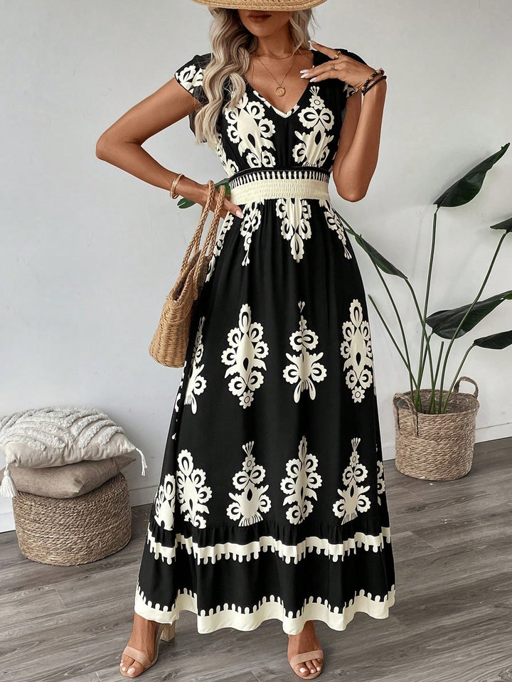Women’s Boho Long Dress with V-neck, fitted stretch waistband and contrasting ornament print Mune Fashion