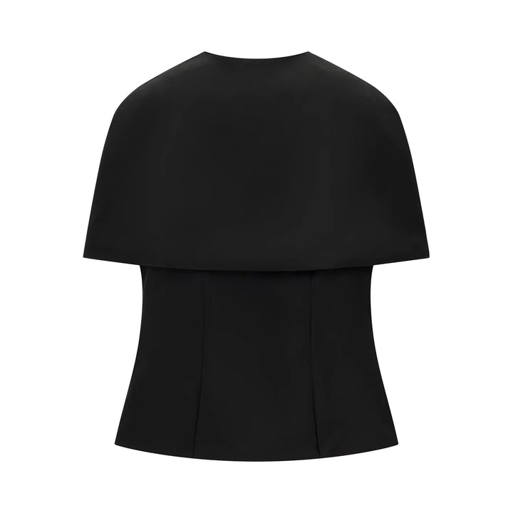 Women's sleeveless cape top with tailored peplum and textured crepe quality Mune Fashion