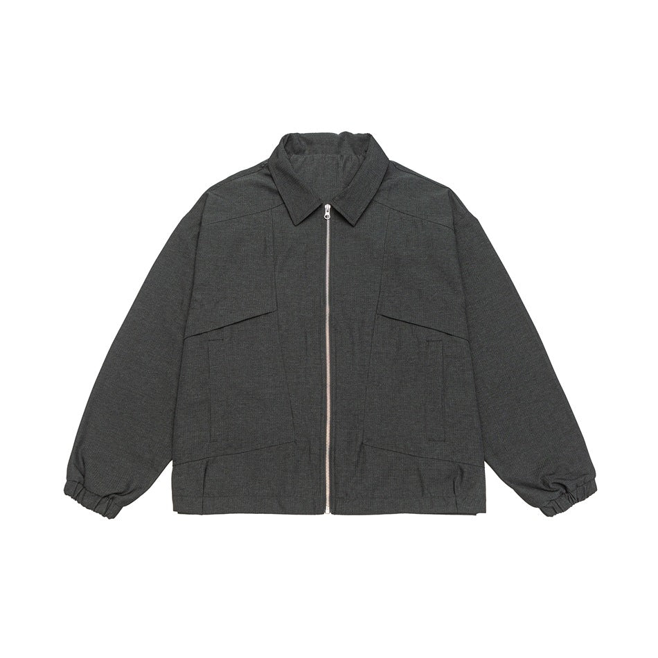 Unisex short jacket in boxy cut with continuous zipper and flap pockets Mune Fashion