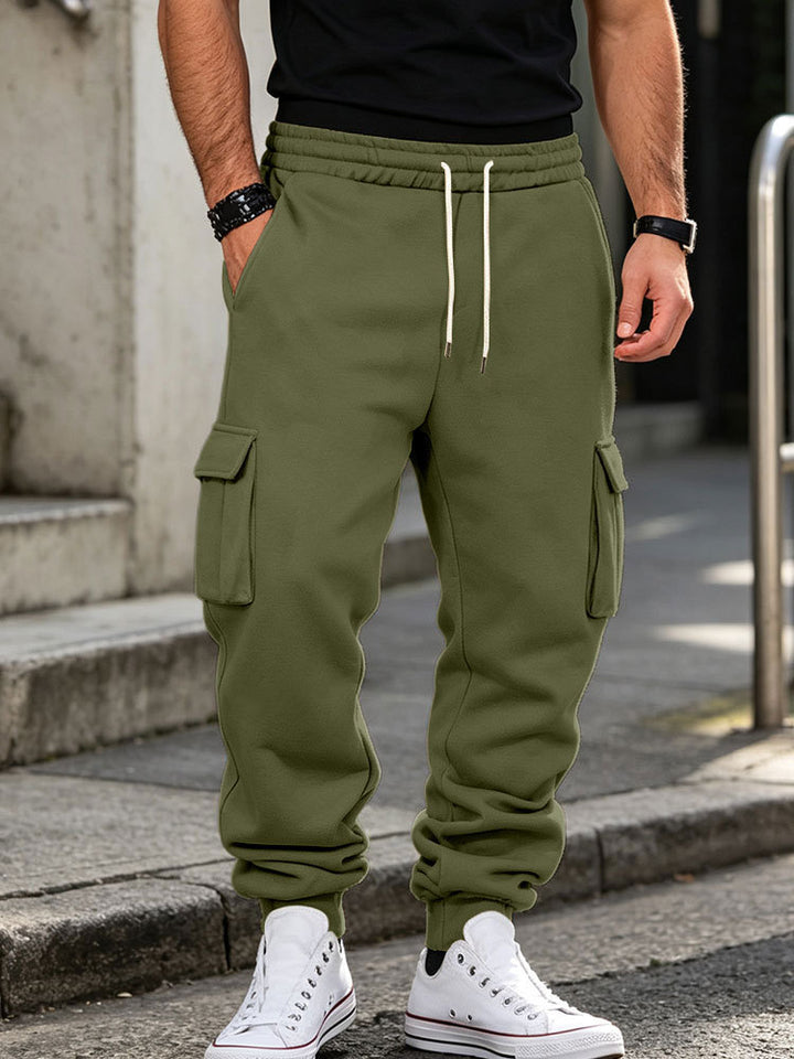 Men's cargo jogging pants made of cotton fleece with elastic waistband and leg cuffs Mune Fashion