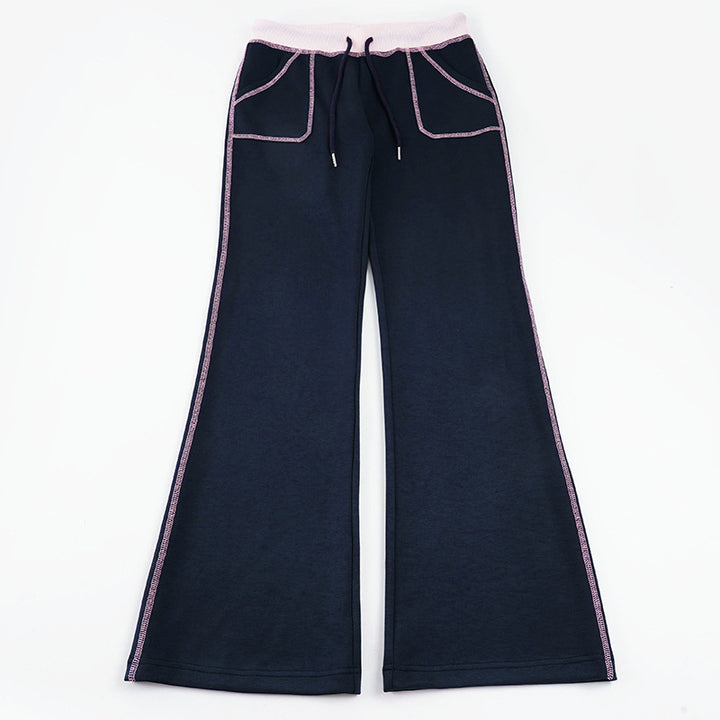 Women nan flared sweatpants with high waistband, drawstring, and contrasting decorative seams Mune Fashion