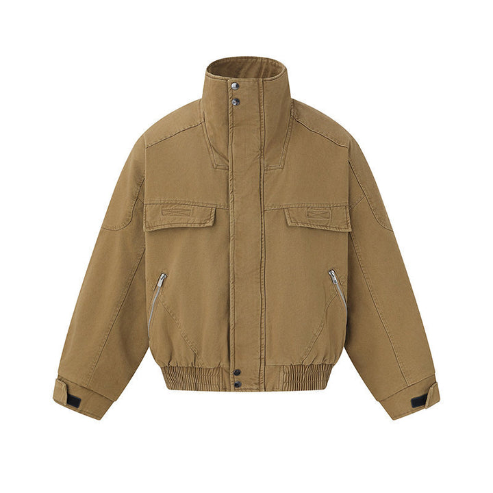Men's short-cut canvas bomber jacket with high stand-up collar, concealed front placket, and zip pockets Mune Fashion