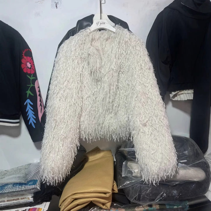 Women's short faux fur jacket with shaggy fringe texture, soft lining and boxy cropped cut Mune Fashion
