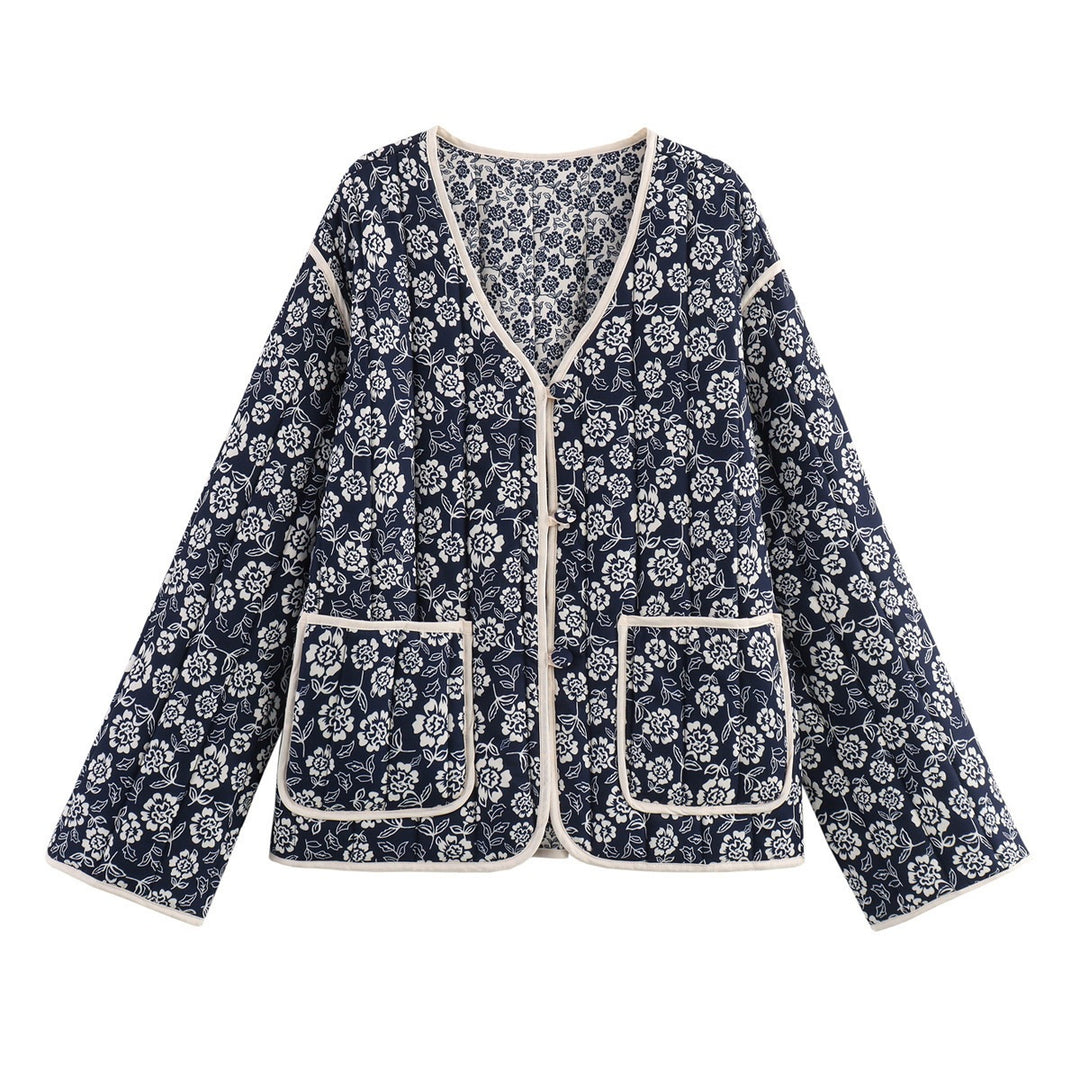 Ladies quilted jacket with floral allover, V-neck, contrast piping and patch pockets Mune Fashion