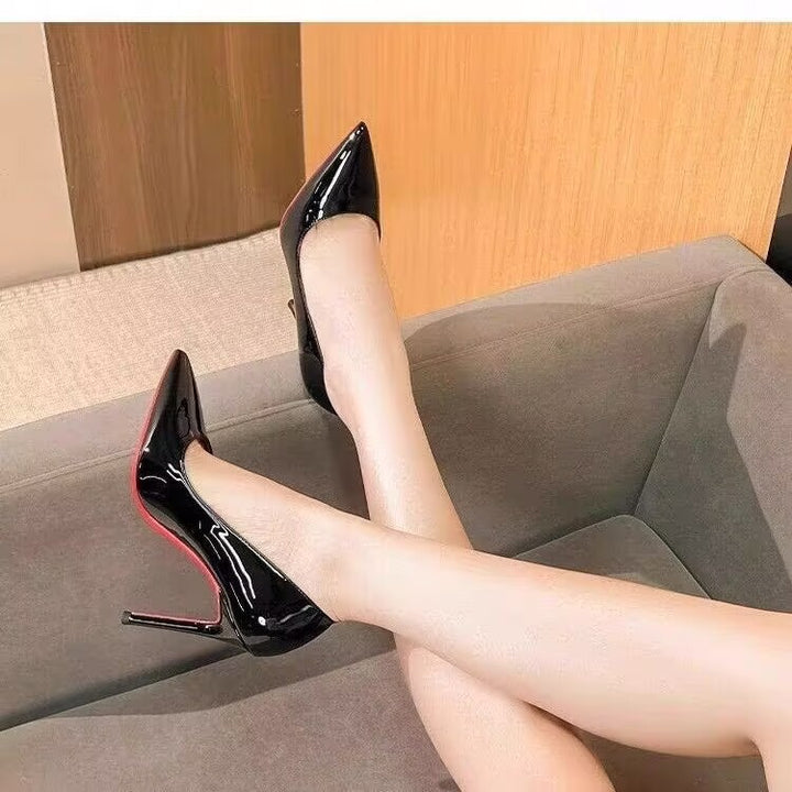 Ladies high-gloss patent pumps with pointed toe and slim stiletto heel Mune Fashion