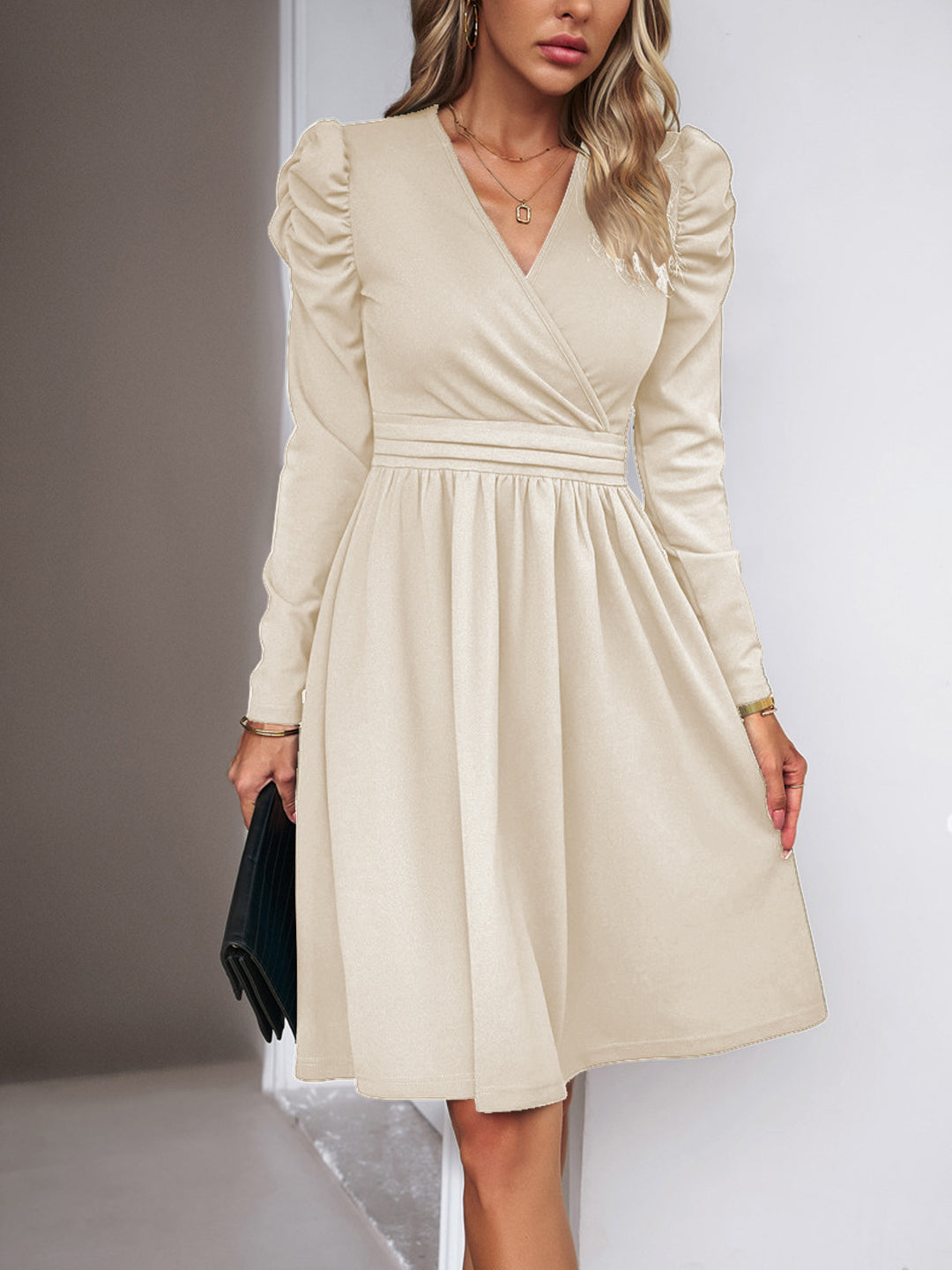 Women's wrap dress with V-neck, gathered puff sleeves, and fitted pleated skirt Drune