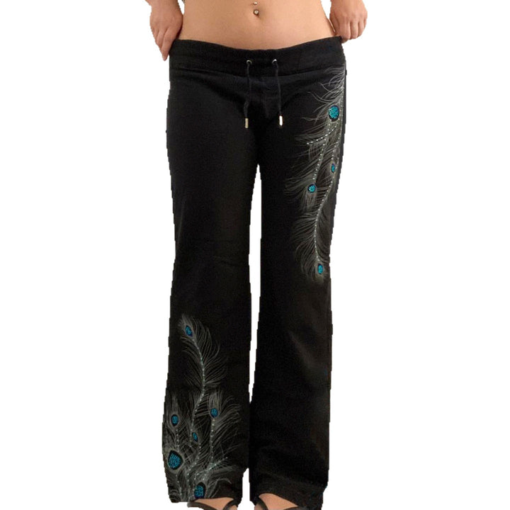 Ladies' wide lounge pants with drawstring, high comfort waistband and peacock feather print Mune Fashion