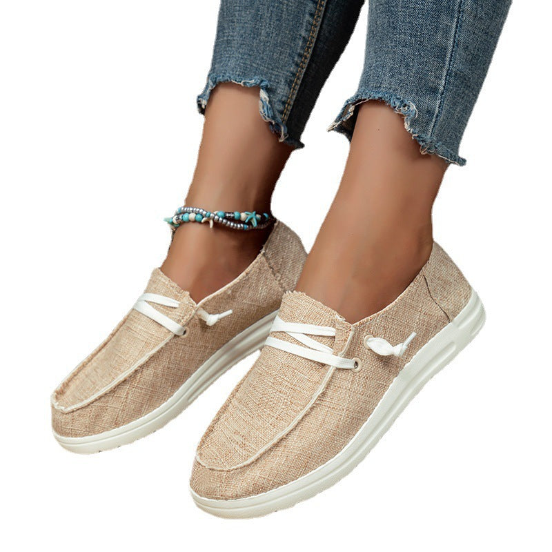 Women’s lightweight canvas slip-ons with decorative lacing, padded comfort insole, and slip-resistant lightweight sole Mune Fashion