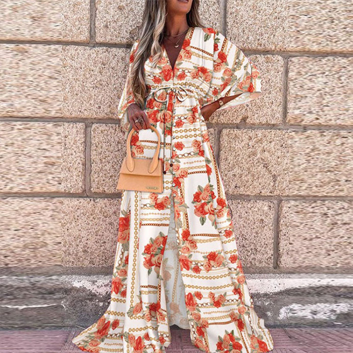 Women's maxi dress with deep V-neck BindMune Fashionand in empire waist kimono sleeves and front slit Mune Fashion