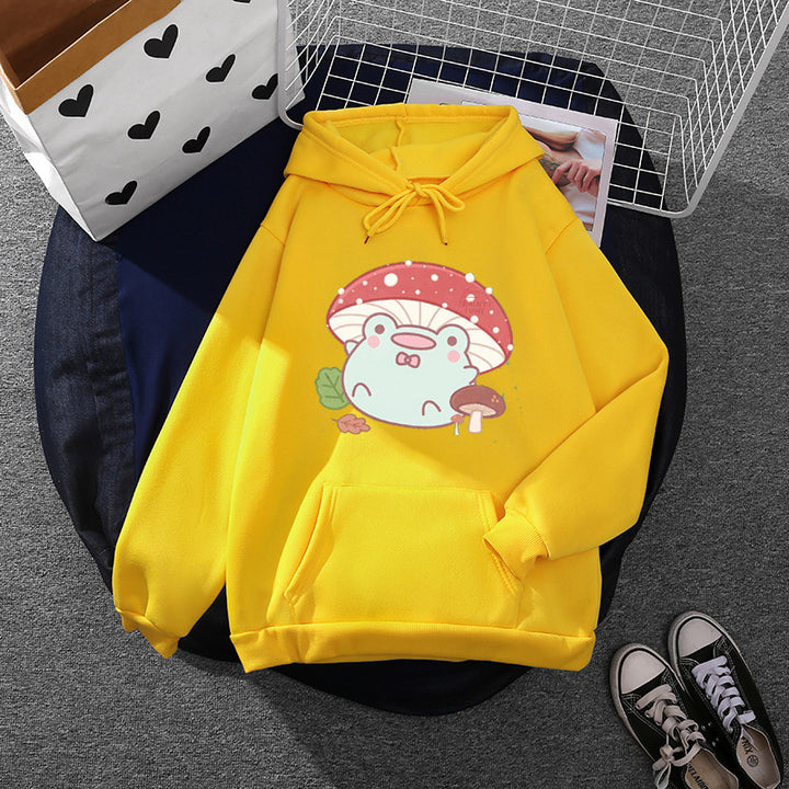 Women’s soft oversized hoodie with kawaii mushroom frog print, kangaroo pocket, and ribbed cuffs Mune Fashion