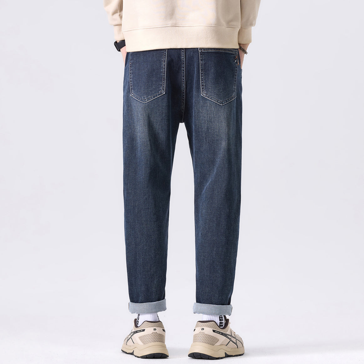 Men's tapered casual jeans with a mid-rise and subtle used wash Mune Fashion