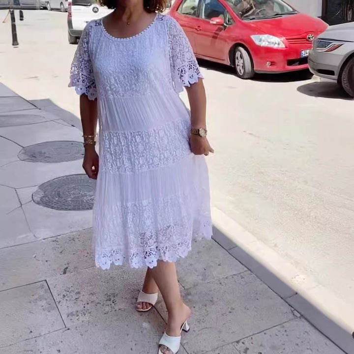 Women's midi dress with lace tiers, pleated inserts and short trumpet sleeves Mune Fashion