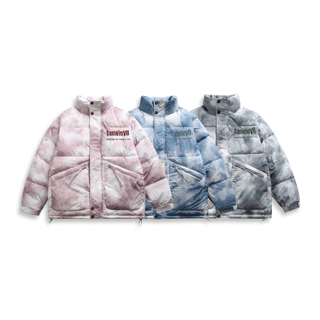 Unisex Short padded blouse jacket in boxy cut with high stand-up collar and diagonal zipper pockets Mune Fashion