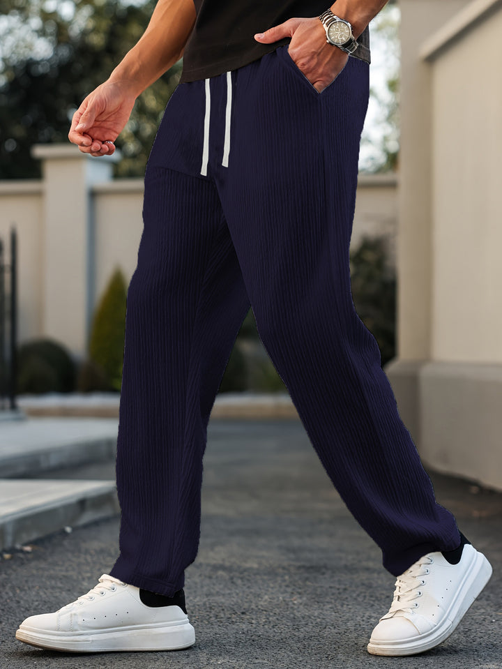 Men's sporty leisure pants with elastic waistband and side pockets Mune Fashion