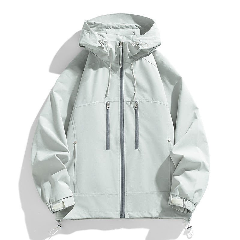 Unisex lightweight windproof softshell hoodie with welded seams, extended back panel and adjustable hem Mune Fashion