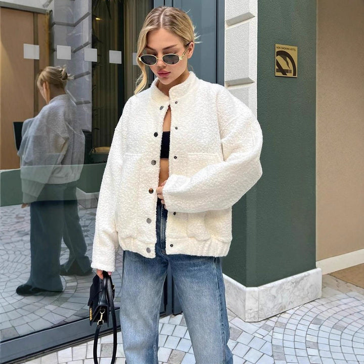 Women's teddy fleece bomber jacket in boxy cut with snap button closure and patch pockets Mune Fashion