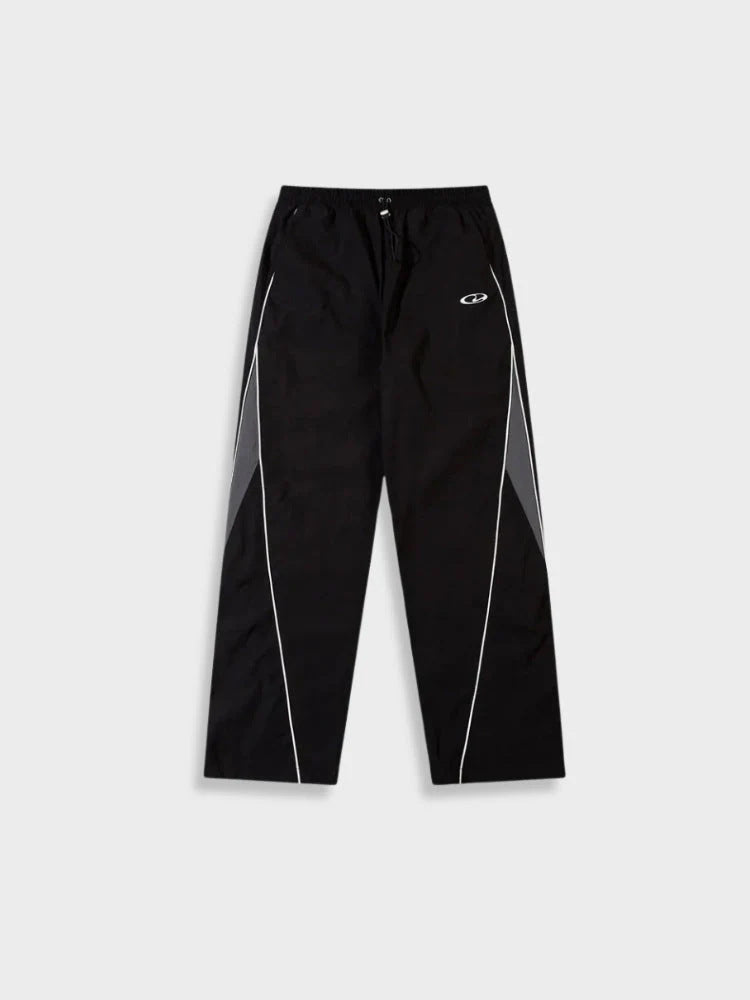 Men's sporty jogging pants with elastic waistband, side contrast piping, and straight cut Mune Fashion