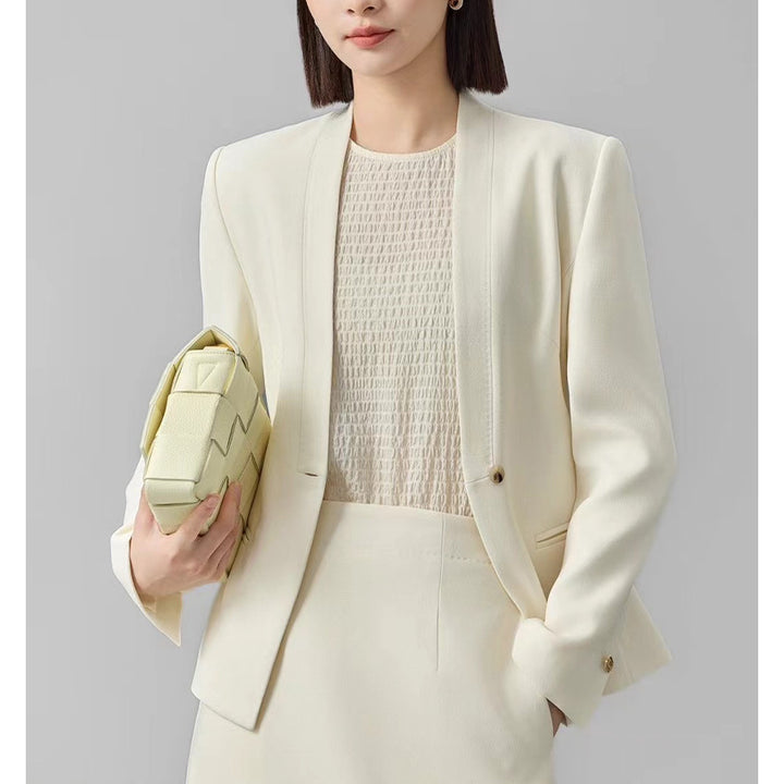 Women’s fitted single-button blazer with minimalist V-front and slip pockets Mune Fashion