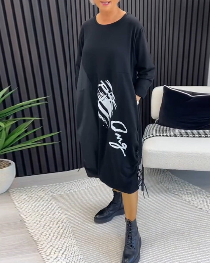 Women's casual jersey dress with side drawstring gathering, patch pockets and statement print Mune Fashion