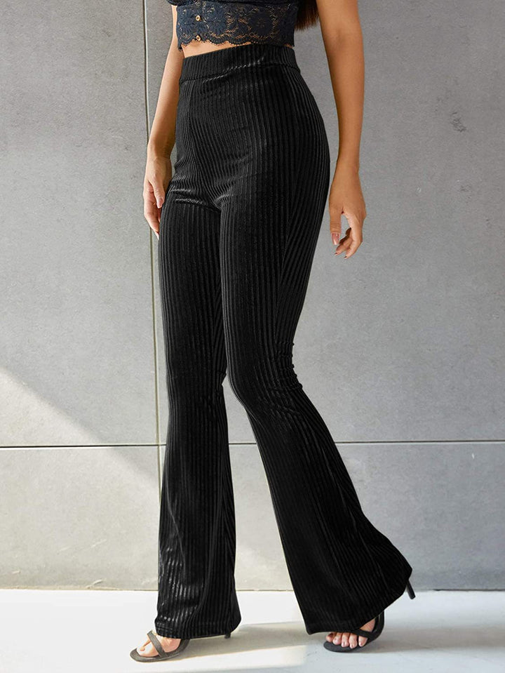 Women's high-waisted ribbed velvet flare trousers with wide flare and elastic waistband Mune Fashion