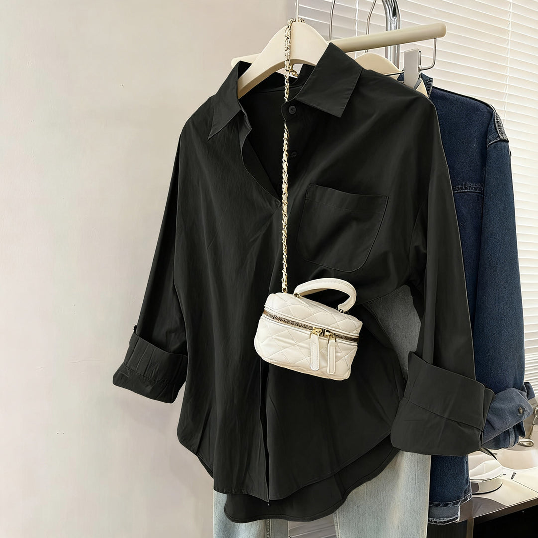 Women's oversized shirt blouse with chest pocket, turned-up sleeves and relaxed fit Mune Fashion