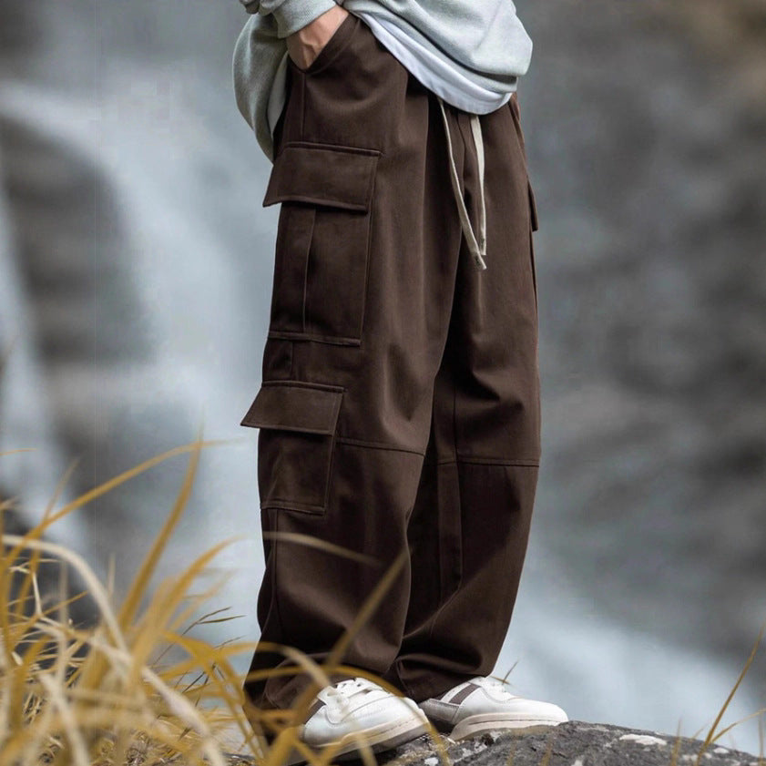 Men's loose cargo pants with multiple pockets, drawstring and reinforced knee areas Mune Fashion