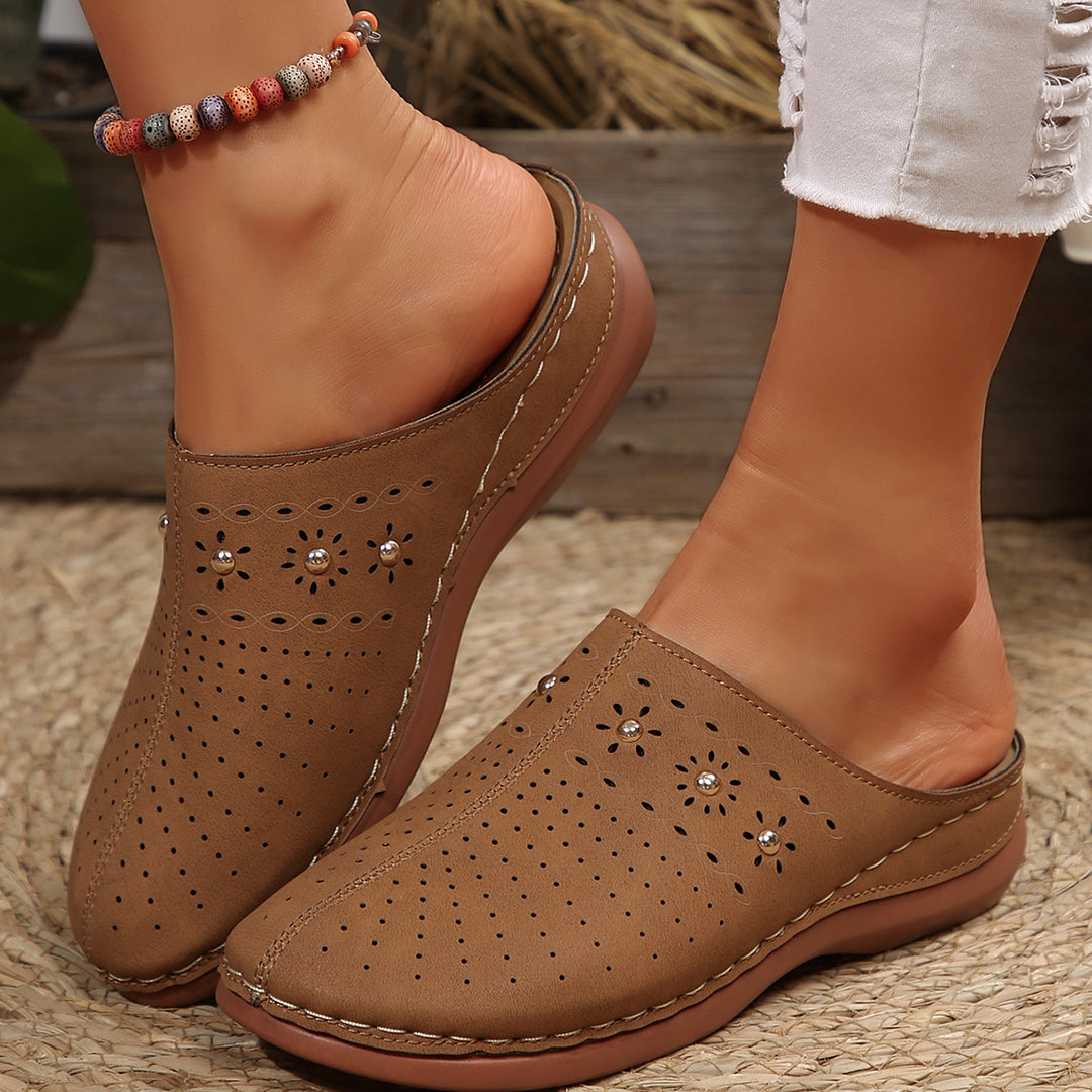 Women's padded mule slippers with fine laser perforation, decorative studs, and ergonomic memory insole Mune Fashion