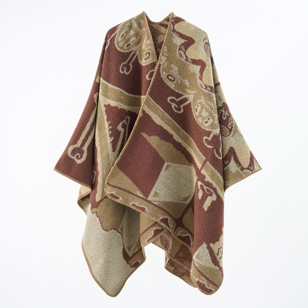 Women's statement cape poncho made from jacquard woven wool blend with skull and bone pattern Mune Fashion