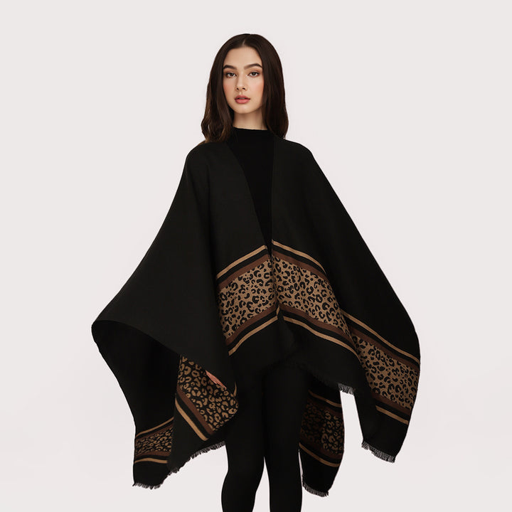 Women's cape poncho made of fine knit with leopard border and asymmetrical hem Mune Fashion