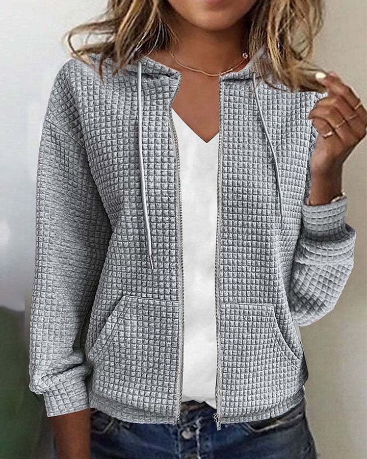 Women's quilted hooded jacket with waffle texture, full zip and kangaroo pockets Mune Fashion