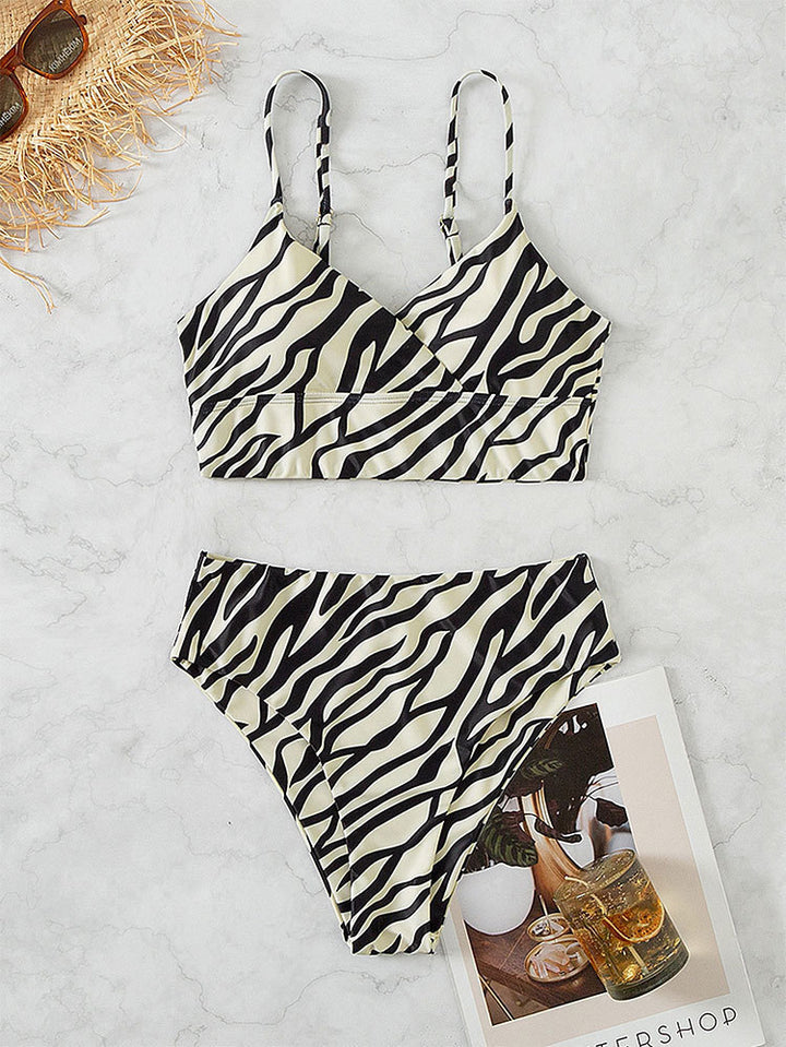Women's bikini set with flattering wrap design and sporty animal print drape
