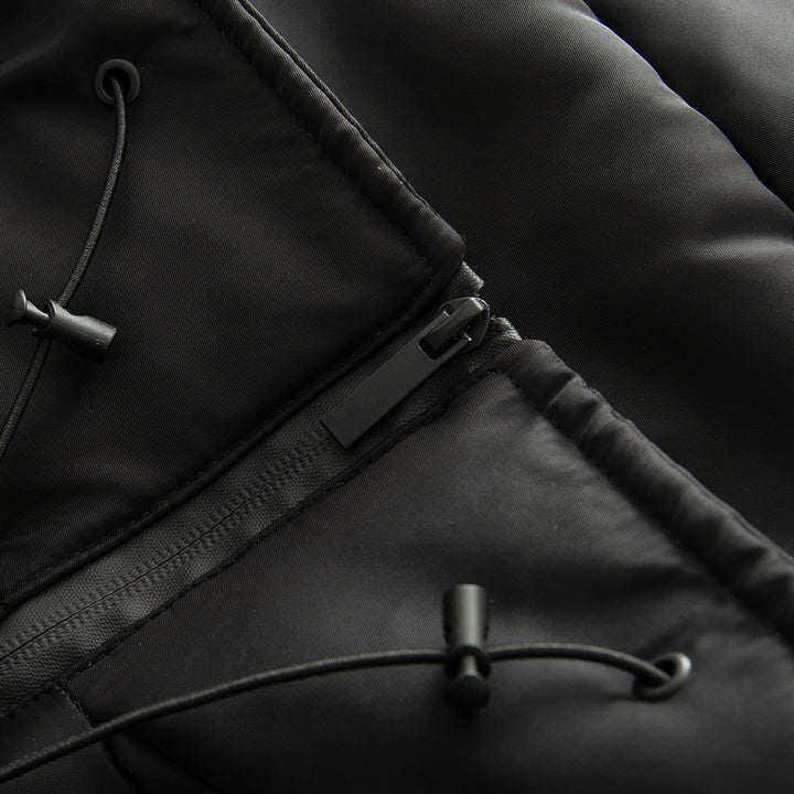 Women's short cut quilted jacket with high stand collar, wide funnel hood, and water-repellent surface Mune Fashion