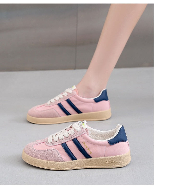 Ladies sporty sneakers with fashionable stripes and cushioned sole Mune Fashion