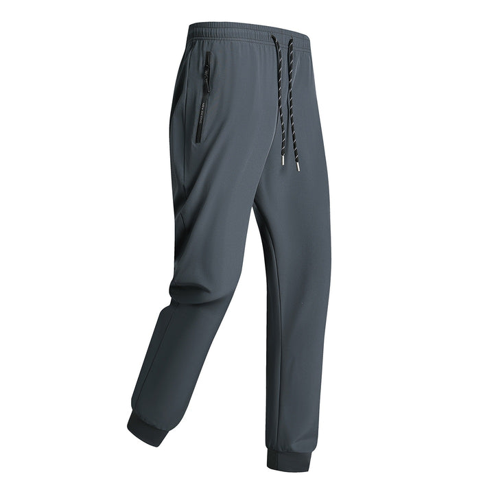 Men's sporty training pants with elastic waistband and zippered pockets Mune Fashion